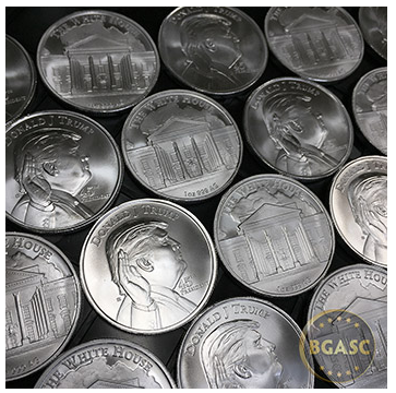 Trump silver rounds displayed on a table
